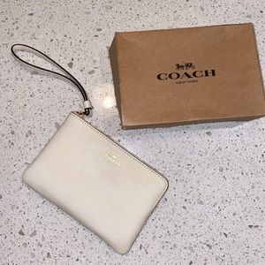 COACH- white leather clutch